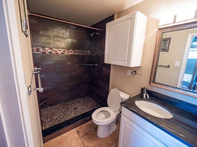 2303 Eastside Dr # 209, Austin, TX 78704 - full bath with vanity and a tile shower