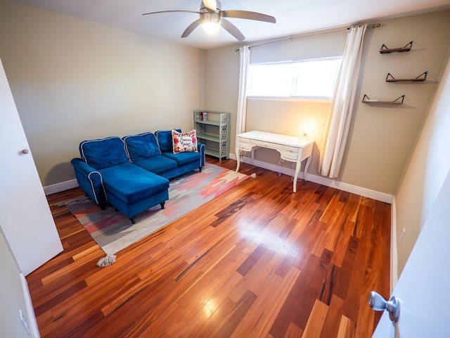 2303 Eastside Dr # 209, Austin, TX 78704 - living area with a ceiling fan and wood finished floors