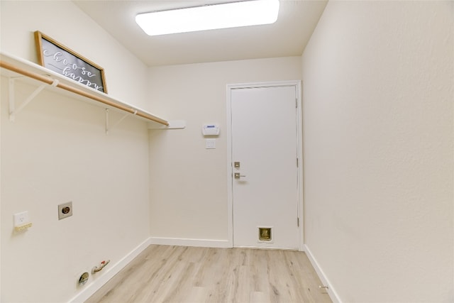 5509 Kayview Dr, Austin, TX 78749 - washroom featuring light wood-style floors, hookup for an electric dryer, and hookup for a gas dryer