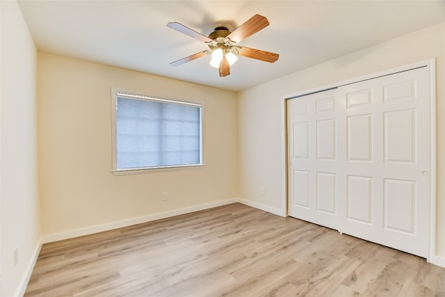 5509 Kayview Dr, Austin, TX 78749 - unfurnished bedroom with light wood-style floors, a closet, and a ceiling fan