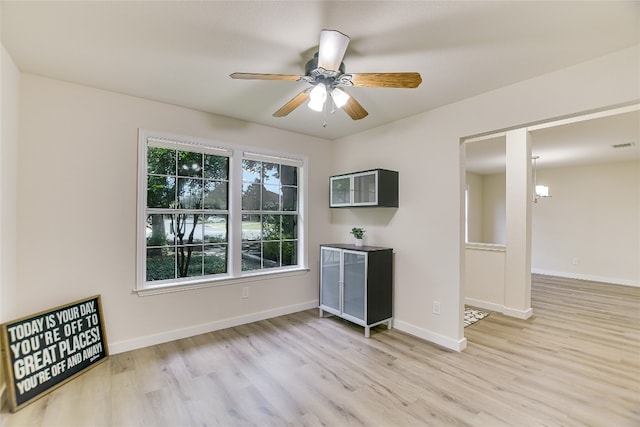5509 Kayview Dr, Austin, TX 78749 - spare room featuring wood finished floors and a ceiling fan