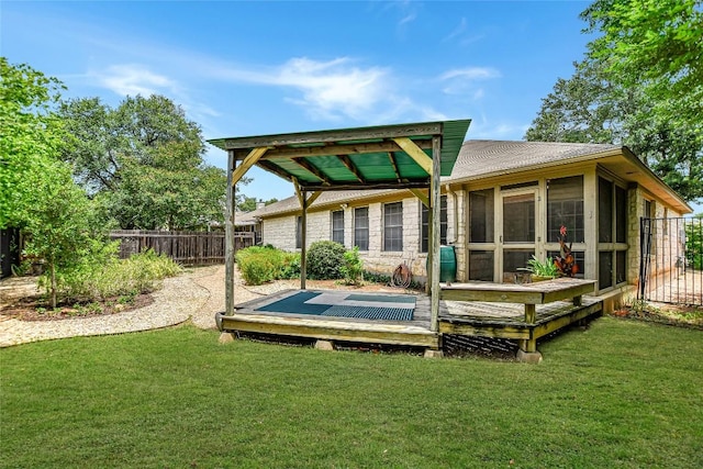 5509 Kayview Dr, Austin, TX 78749 - rear view of property with a wooden deck, a sunroom, and stone siding