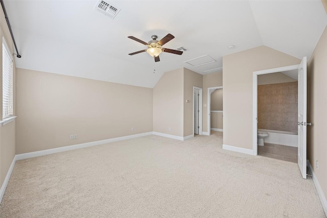 17900 Crimson Apple Way, Pflugerville, TX 78660 - additional living space with a ceiling fan, carpet, vaulted ceiling, and attic access