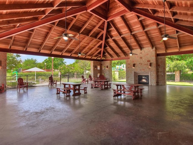 17900 Crimson Apple Way, Pflugerville, TX 78660 - view of patio / terrace with a lit fireplace, ceiling fan, and a gazebo