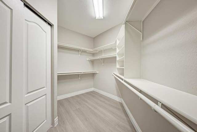 4408 Tello Path, Austin, TX 78749 - spacious closet featuring light wood-style floors