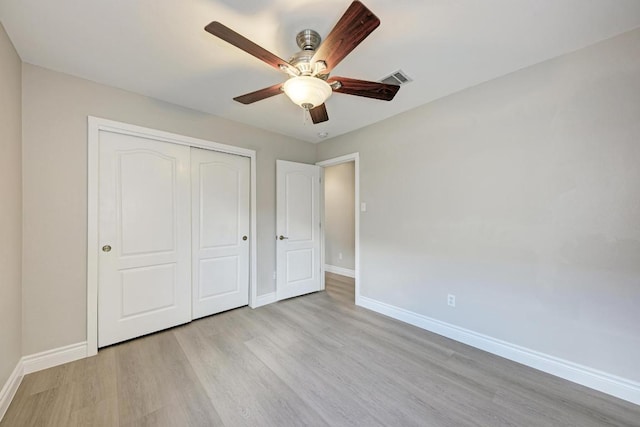 4408 Tello Path, Austin, TX 78749 - unfurnished bedroom with wood finished floors, a closet, and ceiling fan