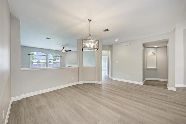 4408 Tello Path, Austin, TX 78749 - empty room with light wood-style floors, a ceiling fan, a chandelier, and recessed lighting