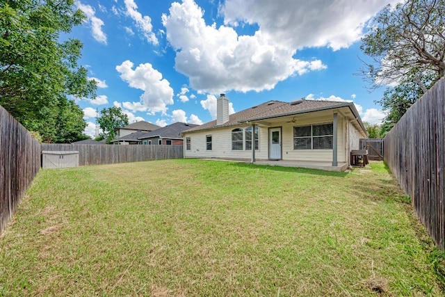 4408 Tello Path, Austin, TX 78749 - rear view of house with a fenced backyard, a chimney, a patio area, and a ceiling fan