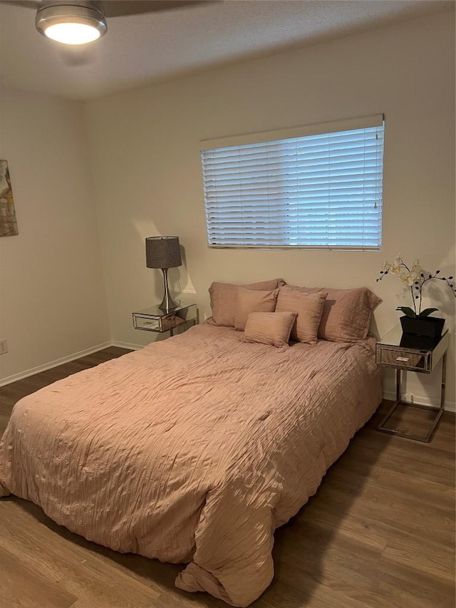 6506 Clubway Ln, Austin, TX 78745 - bedroom featuring dark wood-style flooring