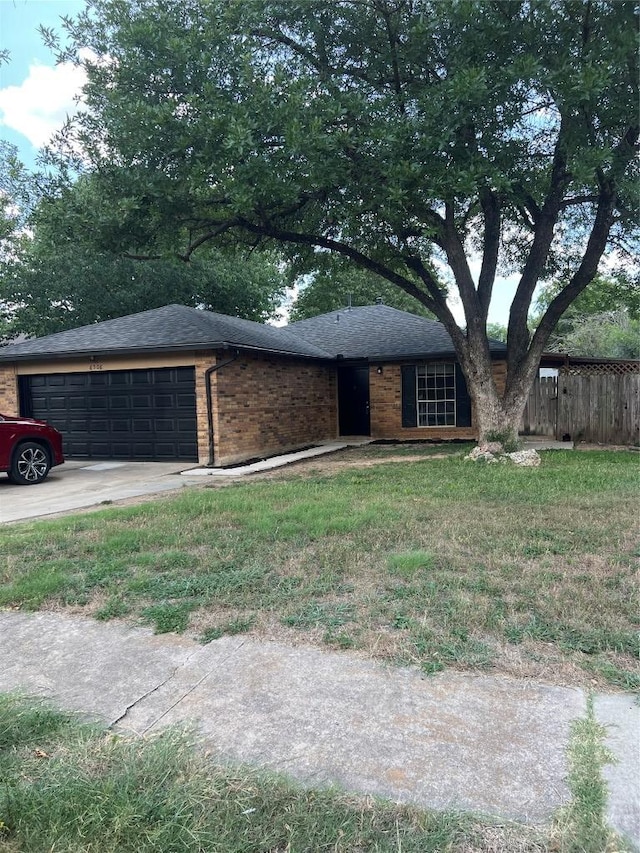 6506 Clubway Ln, Austin, TX 78745 - single story home featuring an attached garage, brick siding, a shingled roof, and driveway