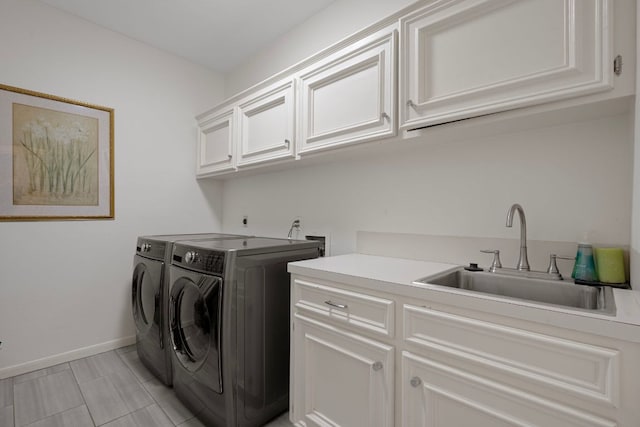 5301 Backtrail Dr, Austin, TX 78731 - laundry room with cabinet space, washing machine and clothes dryer, and light tile patterned floors