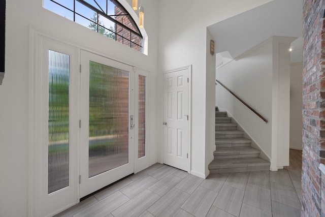 5301 Backtrail Dr, Austin, TX 78731 - foyer entrance featuring stairs and a towering ceiling