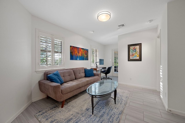 5301 Backtrail Dr, Austin, TX 78731 - living room featuring a desk and wood tiled floors