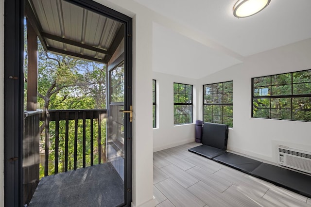 5301 Backtrail Dr, Austin, TX 78731 - unfurnished sunroom featuring lofted ceiling and a wall mounted AC