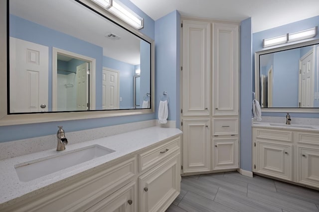 5301 Backtrail Dr, Austin, TX 78731 - full bath with two vanities and a shower