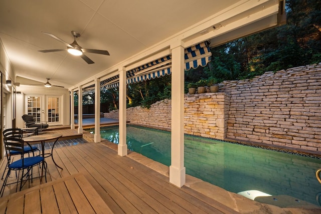 5301 Backtrail Dr, Austin, TX 78731 - wooden terrace with french doors, ceiling fan, and an outdoor pool