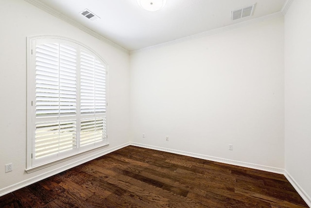 3340 Marcasite Dr, Round Rock, TX 78681 - spare room with dark wood-type flooring and crown molding