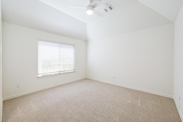 3340 Marcasite Dr, Round Rock, TX 78681 - empty room featuring light carpet, a ceiling fan, and vaulted ceiling