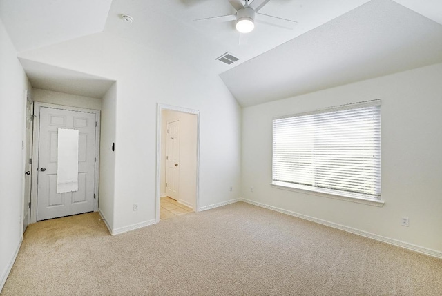 3340 Marcasite Dr, Round Rock, TX 78681 - unfurnished bedroom featuring light colored carpet, vaulted ceiling, and connected bathroom
