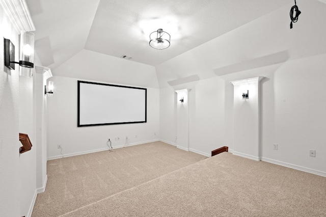 3340 Marcasite Dr, Round Rock, TX 78681 - carpeted home theater room with lofted ceiling and decorative columns
