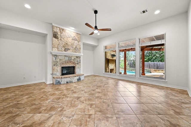 3340 Marcasite Dr, Round Rock, TX 78681 - unfurnished living room featuring a ceiling fan, recessed lighting, a fireplace, and tile patterned floors