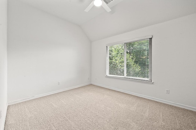 3340 Marcasite Dr, Round Rock, TX 78681 - empty room featuring carpet floors, vaulted ceiling, and ceiling fan