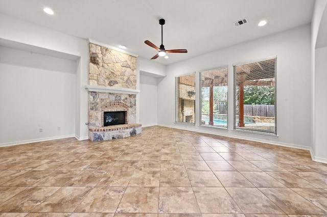 3340 Marcasite Dr, Round Rock, TX 78681 - unfurnished living room featuring ceiling fan, recessed lighting, tile patterned floors, and a fireplace