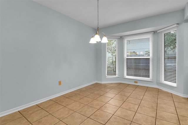 1928 Ramona Cir, San Marcos, TX 78666 - spare room with light tile patterned flooring and a chandelier