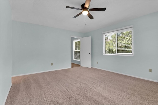 1928 Ramona Cir, San Marcos, TX 78666 - spare room with carpet flooring and ceiling fan