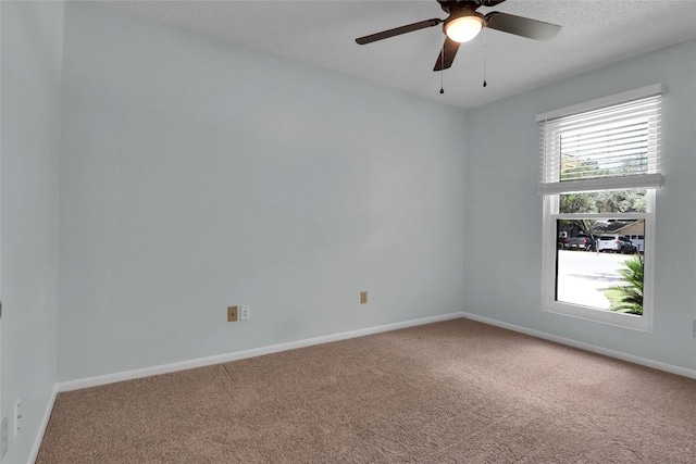 1928 Ramona Cir, San Marcos, TX 78666 - spare room with carpet floors and a ceiling fan