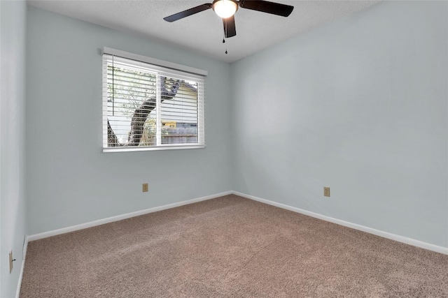 1928 Ramona Cir, San Marcos, TX 78666 - spare room with carpet flooring and a ceiling fan