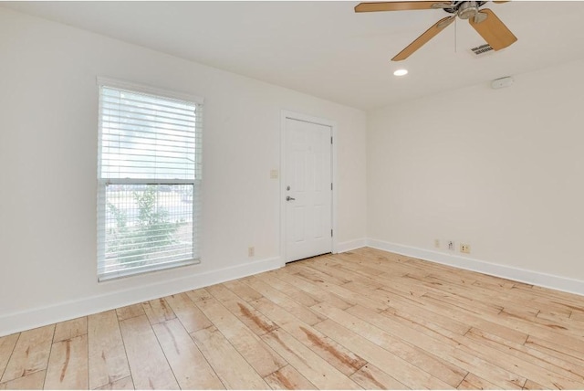 1101 Grove Blvd Unit 102, Austin, TX 78741 - unfurnished room with a ceiling fan, hardwood / wood-style flooring, and recessed lighting