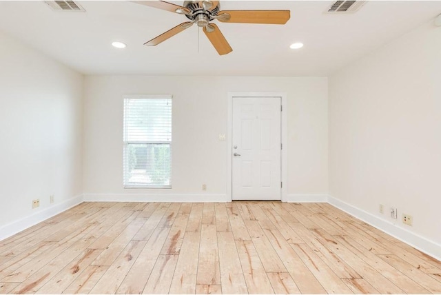 1101 Grove Blvd Unit 102, Austin, TX 78741 - unfurnished room with light wood finished floors, ceiling fan, and recessed lighting