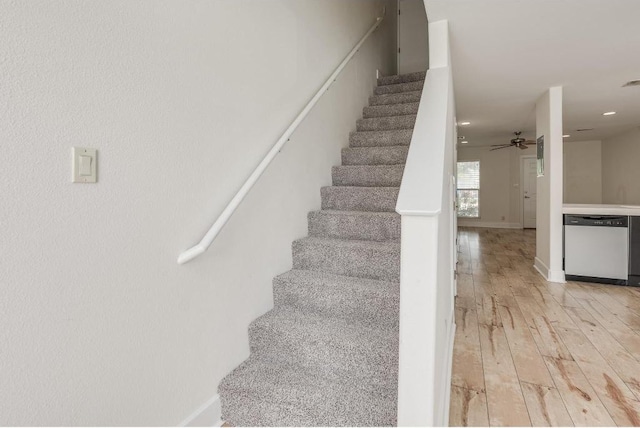 1101 Grove Blvd Unit 102, Austin, TX 78741 - stairway featuring wood-type flooring and ceiling fan