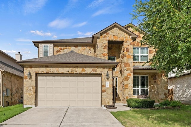 614 Spanish Mustang Dr, Cedar Park, TX 78613 - view of front of property featuring stone siding, concrete driveway, and a garage