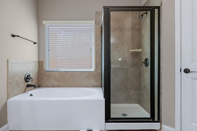 614 Spanish Mustang Dr, Cedar Park, TX 78613 - bathroom with a bath and a stall shower