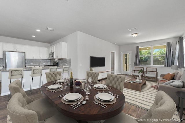 14405 Frankel Loop Unit 34A, Pflugerville, TX 78660 - dining area with wood finished floors and recessed lighting