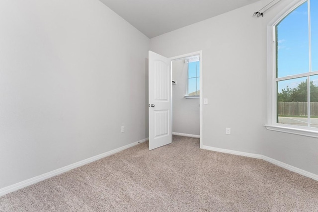 14405 Frankel Loop Unit 34A, Pflugerville, TX 78660 - carpeted spare room featuring baseboards