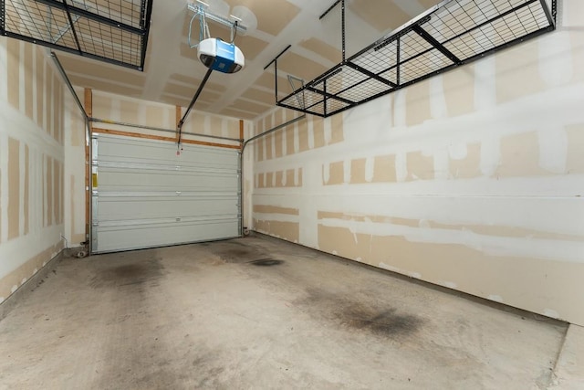 14405 Frankel Loop Unit 34A, Pflugerville, TX 78660 - garage featuring a garage door opener