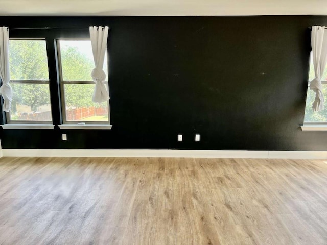 2118 Howell Mountain Dr, Cedar Park, TX 78613 - unfurnished room with wood finished floors and baseboards