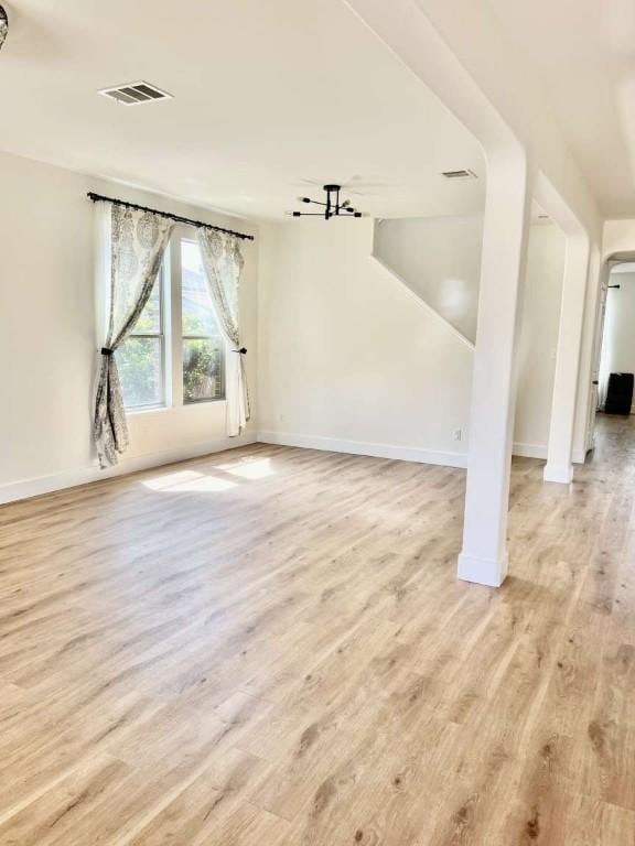 2118 Howell Mountain Dr, Cedar Park, TX 78613 - unfurnished living room with wood finished floors