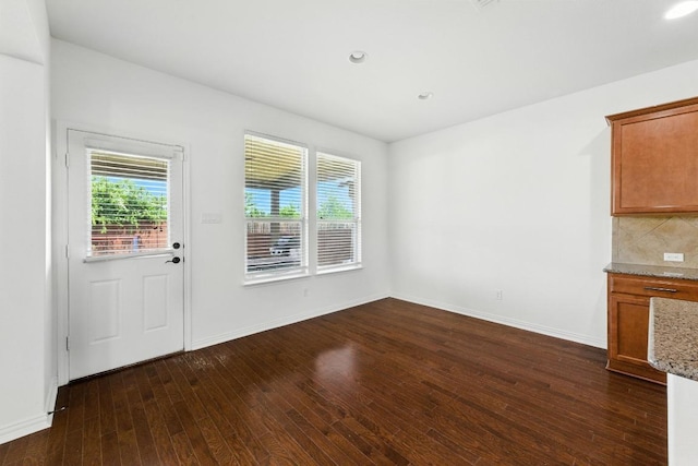 16300 Travesia Way, Austin, TX 78728 - unfurnished dining area with plenty of natural light, dark wood-style floors, and recessed lighting
