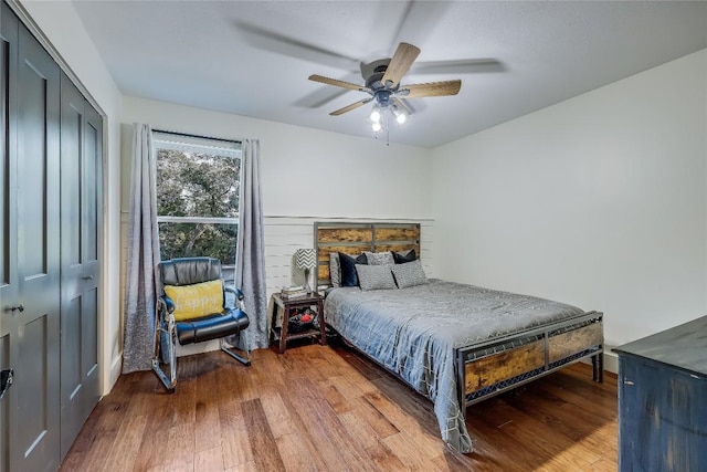 20008 Victoria Chase Rd, Lago Vista, TX 78645 - bedroom featuring wood finished floors, a closet, and ceiling fan