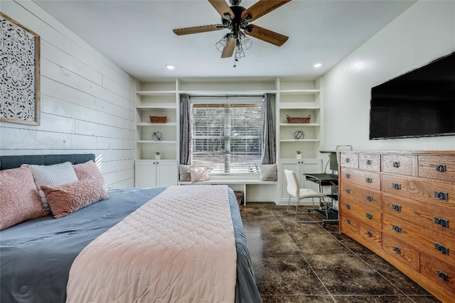 20008 Victoria Chase Rd, Lago Vista, TX 78645 - bedroom with wooden walls, a ceiling fan, and recessed lighting
