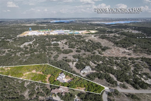 20008 Victoria Chase Rd, Lago Vista, TX 78645 - aerial view of property and surrounding area with a nearby body of water and property boundaries highlighted