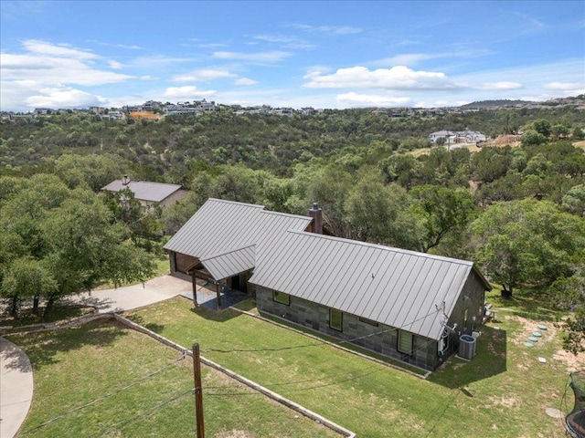 2817 Tradewind Dr, Spicewood, TX 78669 - aerial view of property and surrounding area with a heavily wooded area