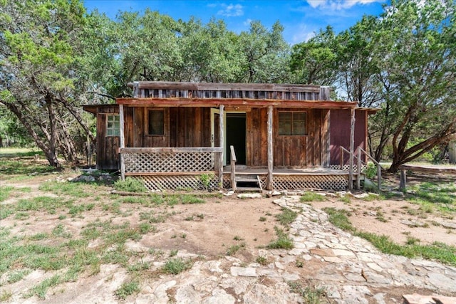 1800 N Rainbow Ranch Rd, Wimberley, TX 78676 - view of front of home featuring covered porch