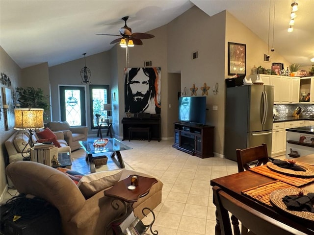 746 Pecan Ln, Cottonwood Shores, TX 78657 - living area with a ceiling fan, light tile patterned floors, and high vaulted ceiling
