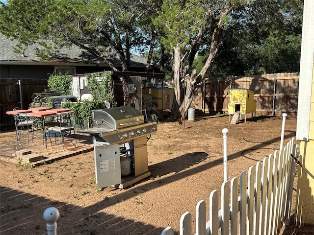 746 Pecan Ln, Cottonwood Shores, TX 78657 - fenced backyard featuring outdoor dining area