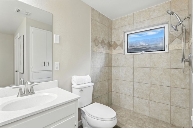 11915 River Oaks Trl, Austin, TX 78753 - bathroom with vanity and a tile shower